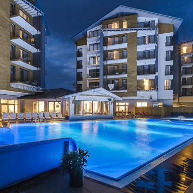 Blue Elevation hotel with modern architecture and pool